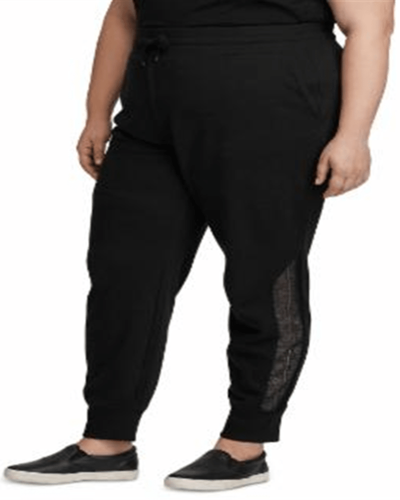 Side of a model wearing a size 3X Ralph Lauren Women's Lace-Trim Terry Jogger Pants Black 3X in Black by Ralph Lauren. | dia_product_style_image_id:308812